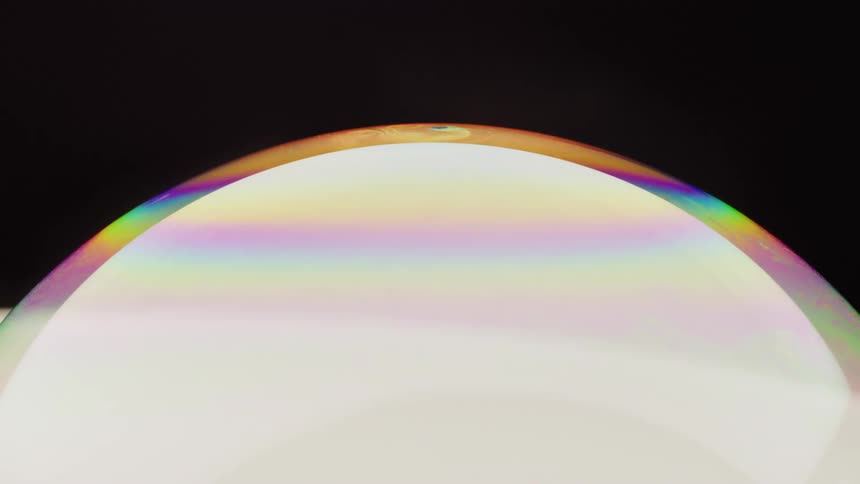 Glowing disk that emits light is bound with rainbow rim
