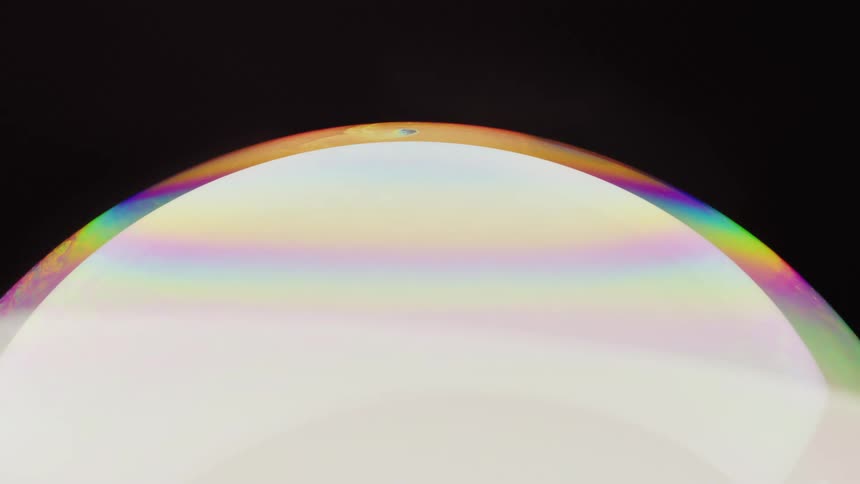 A rainbow globe gives off an aura