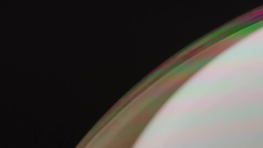 Close up of abstract sphere turning on black background