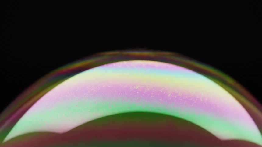 Colorful abstract liquid bubble on a black background