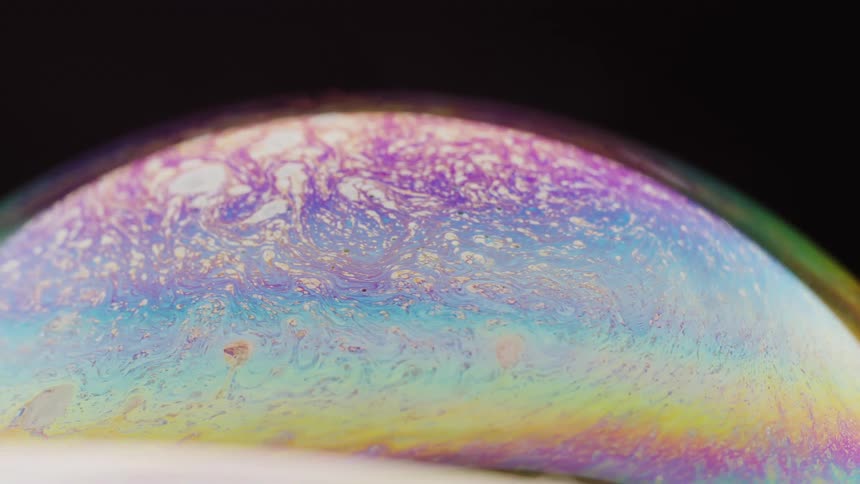 Colorful abstract liquid particles swirl