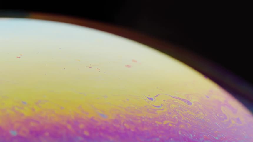 The orb has rainbow colors moving around inside