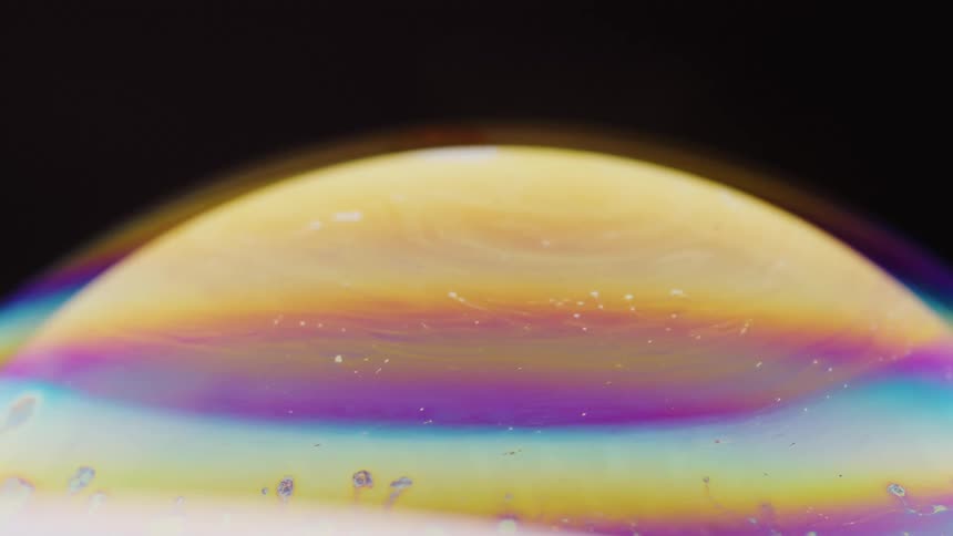 Moving liquid texture of colorful and abstract orbits