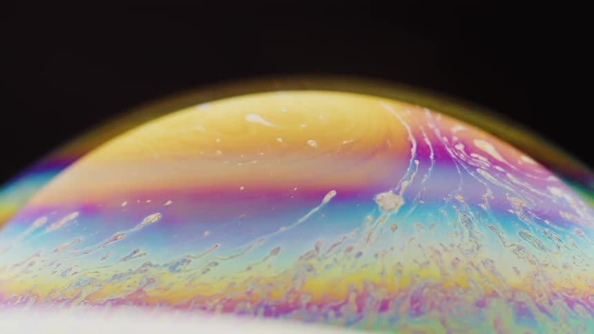 The rainbow colors are mixing around on the globe