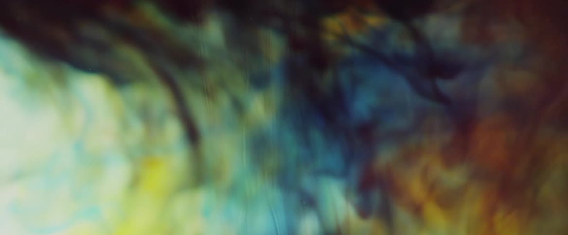 Blurry abstract art with clouds of colorful smoke