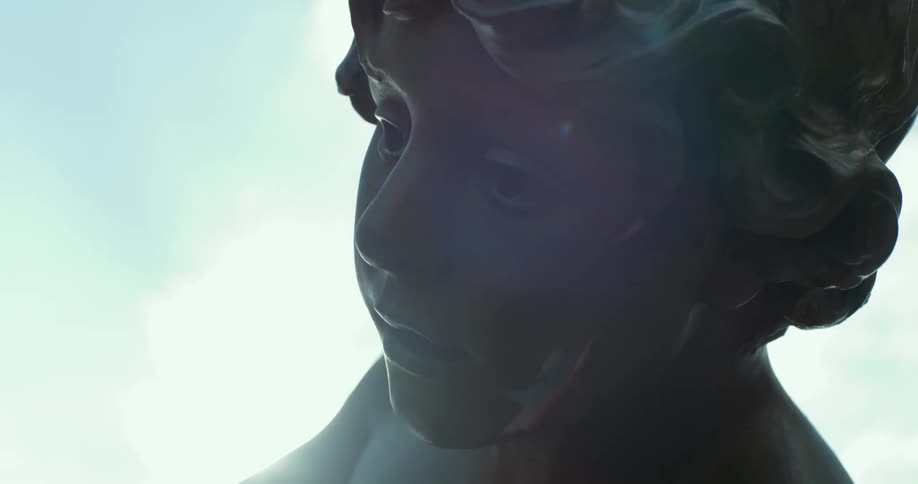 Closeup of a bronze statue of a child