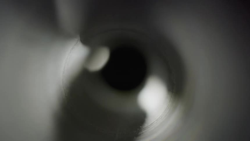 Light briefly rotates around hole before aperture expands
