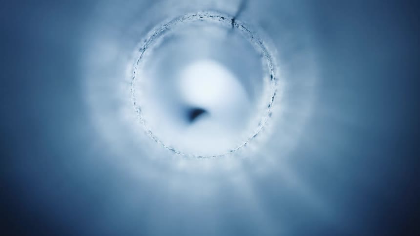 White light passing through an abstract cylinder