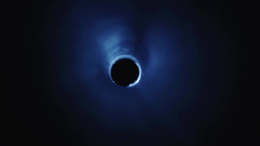 Beam of light passing through an abstract cylindrical hole