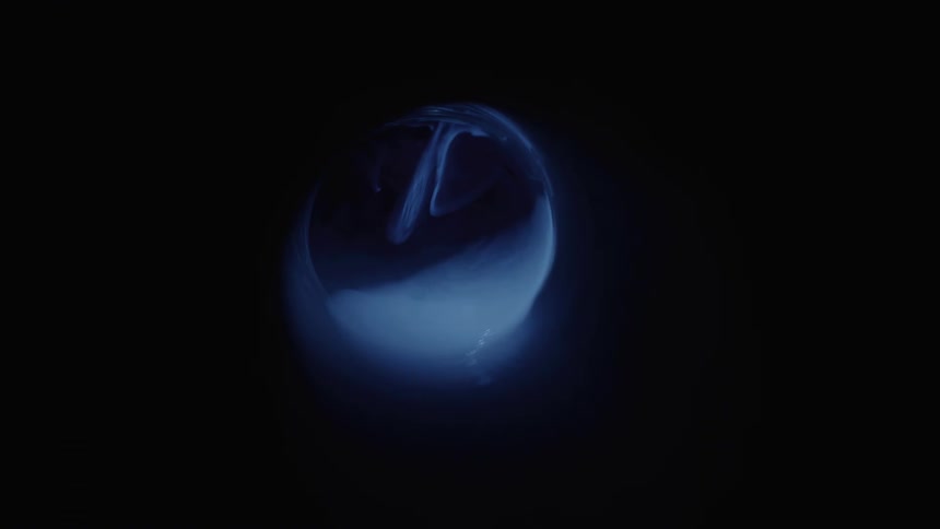 Dark cylinder with low abstract lighting and smoke