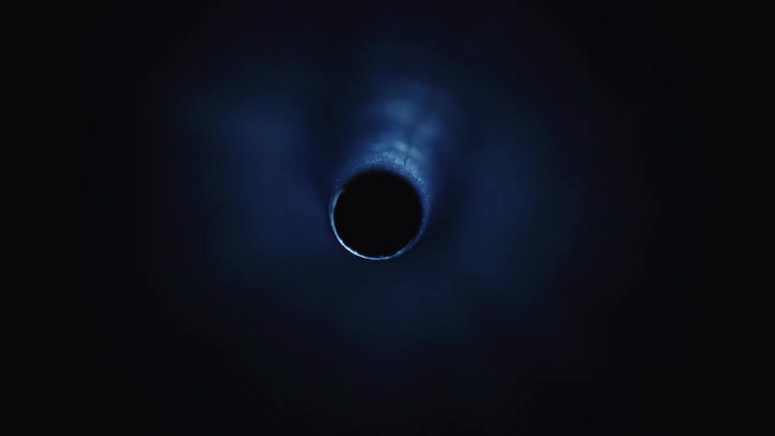 Beam of light passing through an abstract round hole