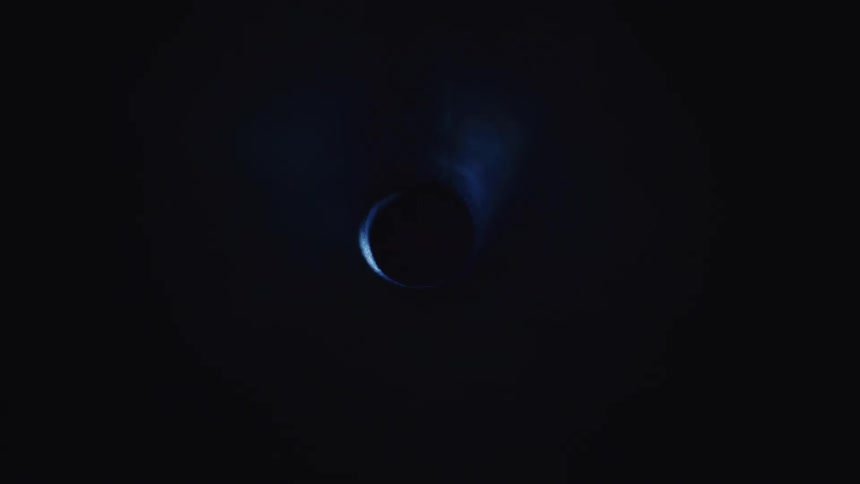 Beam of light passing through a rotating reflection in an abstract hole