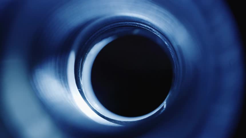 A hole with a beam of white light