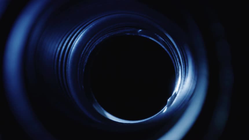 A tube with a hole rotating in the night