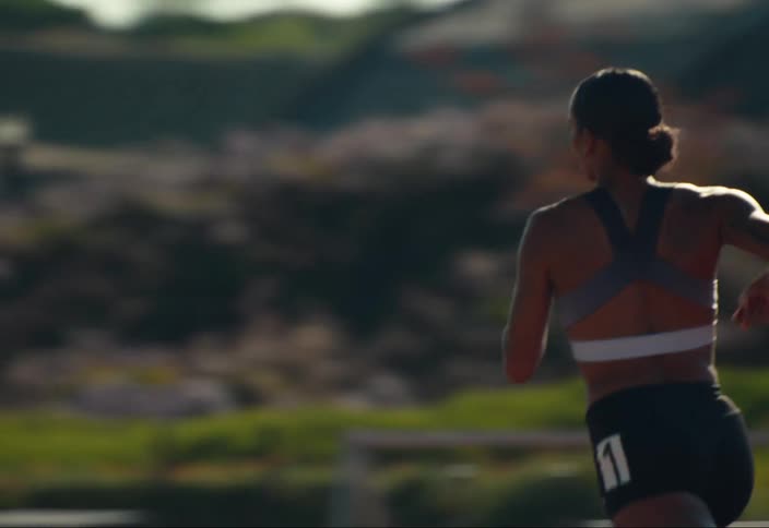 Athlete running at a track meet