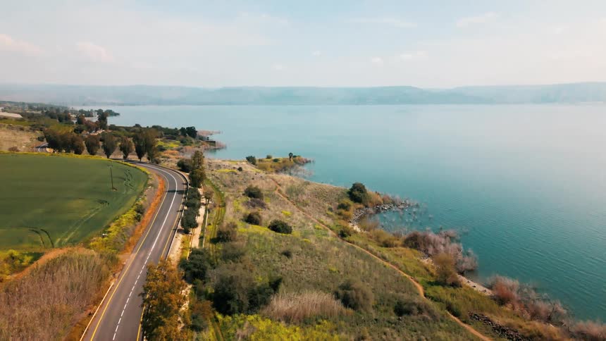 A road along a coastal field