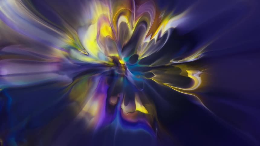 Mixed colors slowly blending together against a black background from the center out like a blossom