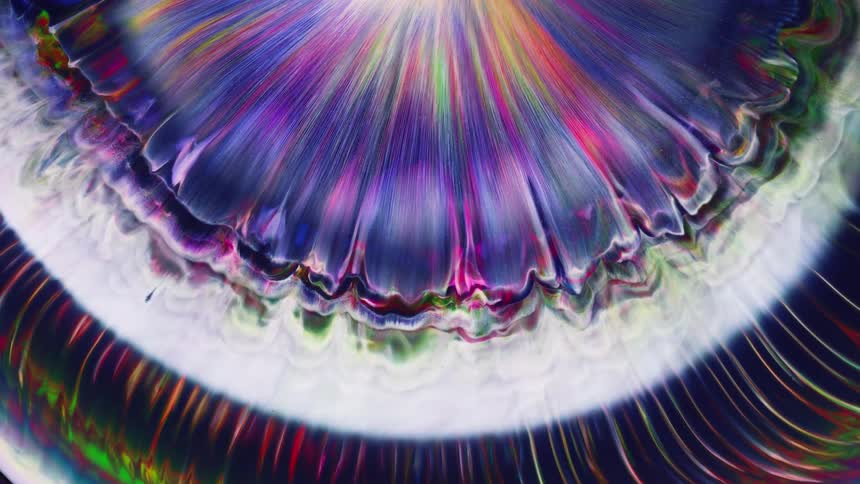 a fractal formation of rings in vibrant colors expands