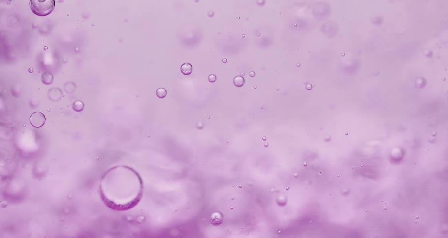 Dense purple liquid with abstract bubbles