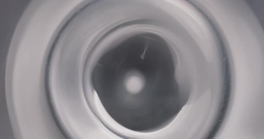 A wheel rotates very fast while emitting bright white light