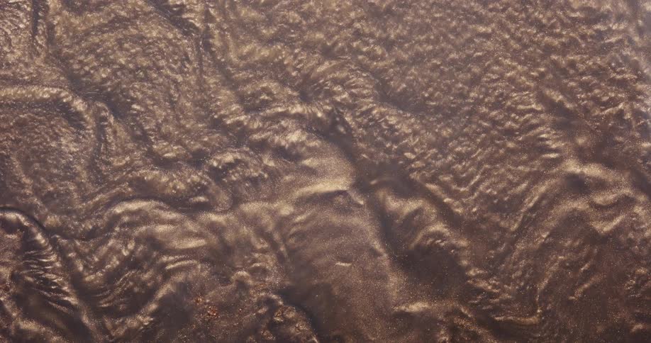 A brown sticky mud