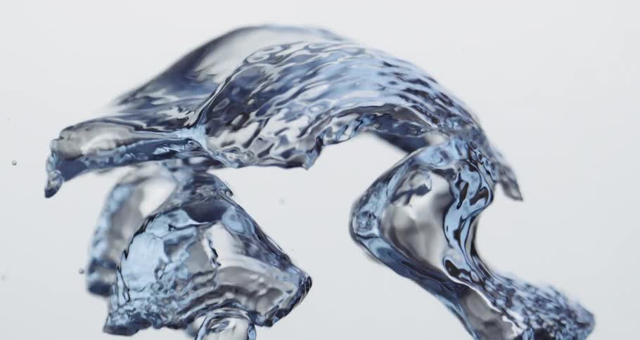 Air bubbles float forming shapes suspended in a clear liquid