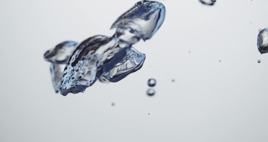 Clear water droplets moving slowly upwards against a white canvas background