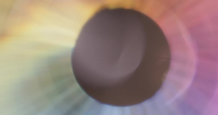 Abstract rainbowcolored lens flare reflections in motion