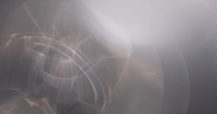 Play of white lights with abstract reflections