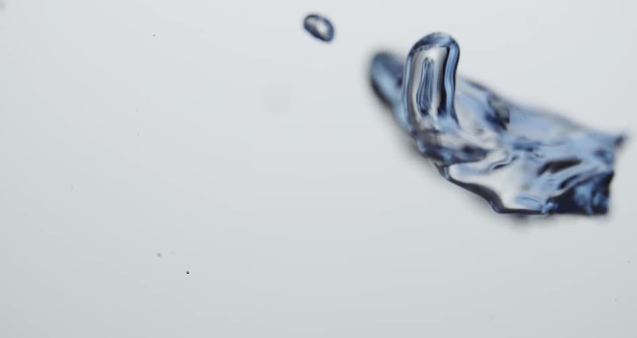Water droplets moving upward slowly against a white canvas background