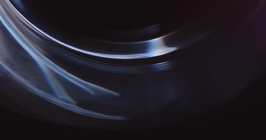 Light in different colors spinning in space