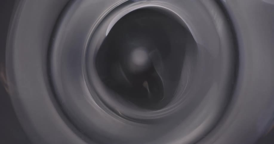 Reflection of light flares against a black background