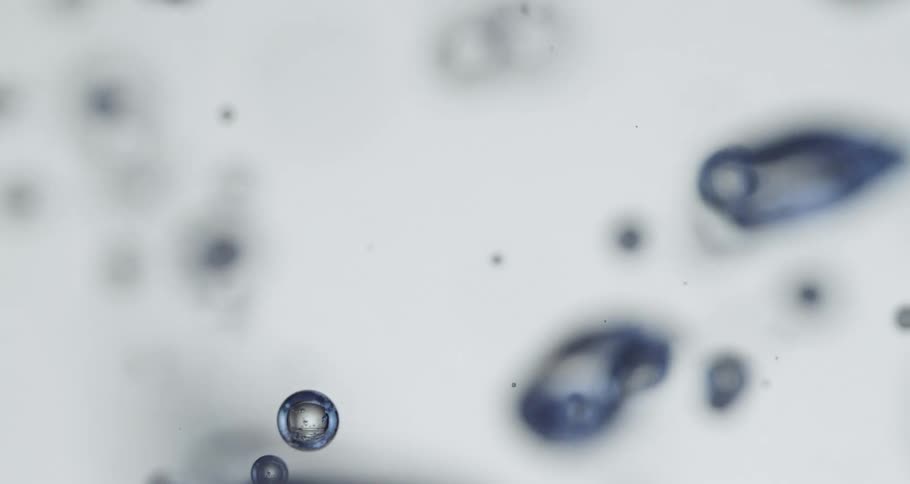 Abstract water droplets rising and falling