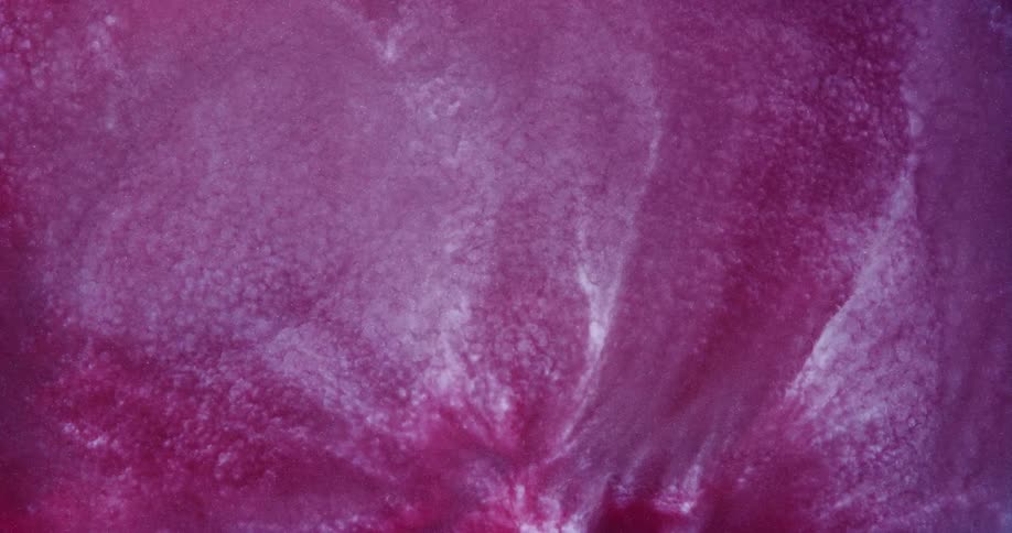 Dense pink and abstract liquid boiling in special effects