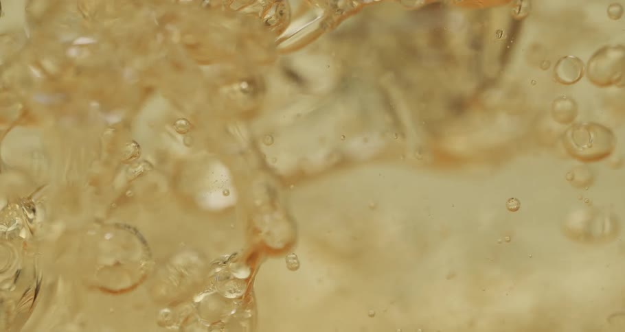 Clear water splashes around in slow motion