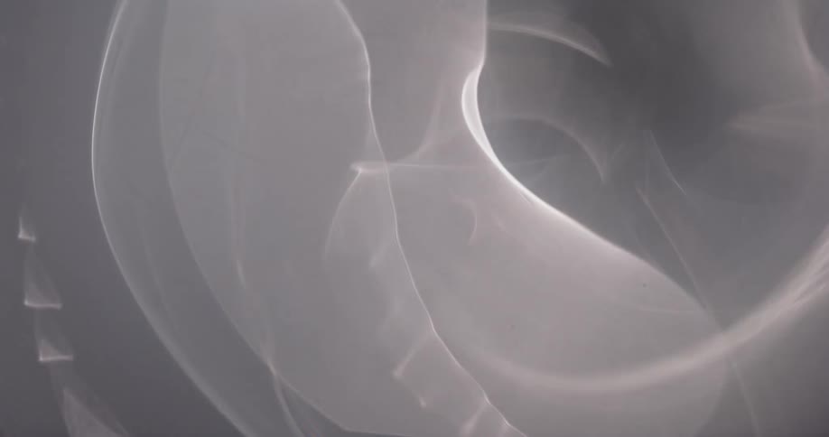 Reflection of light flares against a black background