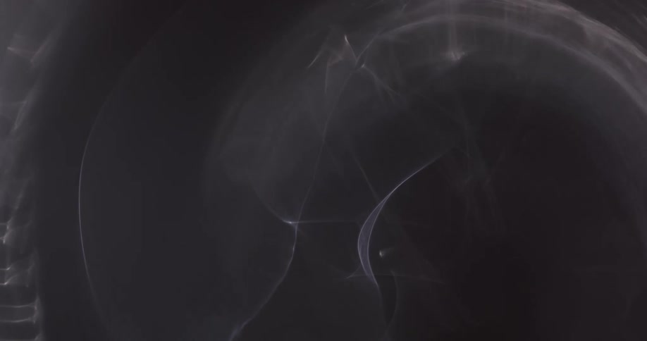 Black background with abstract moving white light reflections