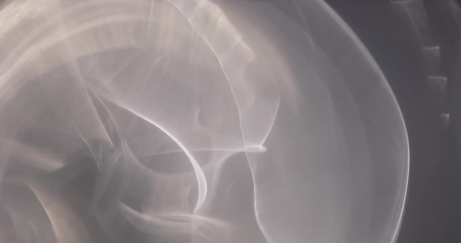 The smoke moves and reflects light