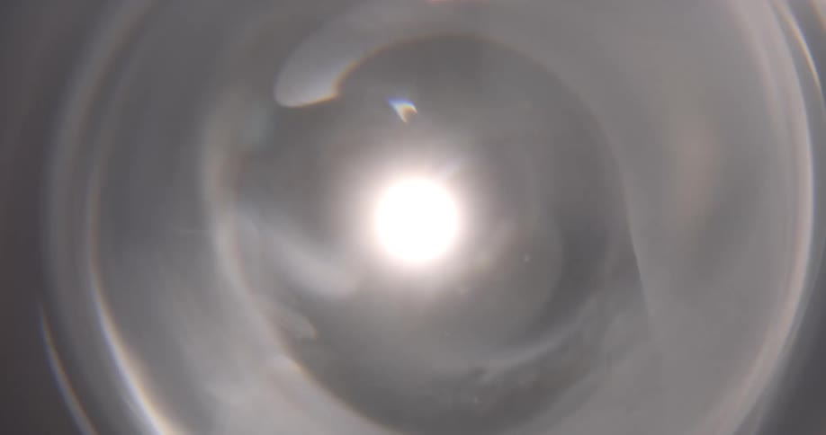 A light at the end of a tunnel shines brightly illuminating the inside