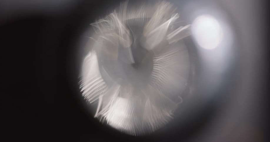 Reflection of light flares against a black background