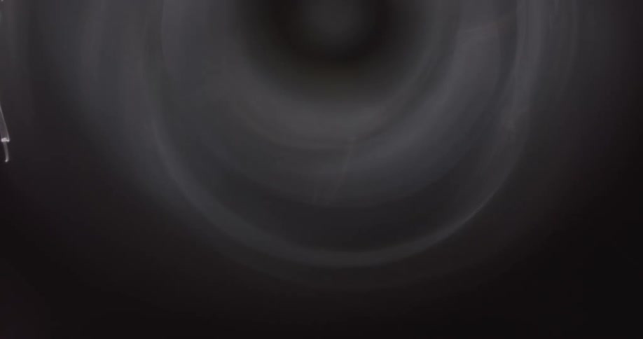 Lights reflect and flare on a lens
