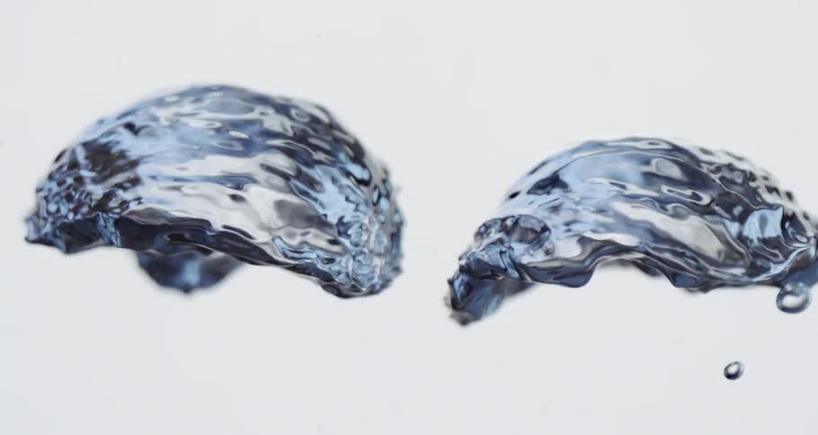 Rippling air bubbles floating on a clear liquid