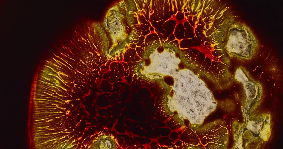 Red and yellow magma like flow flare up and break