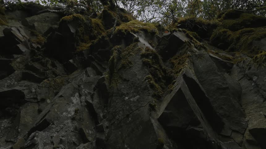 Rocks on the face of a cliff in the mountains