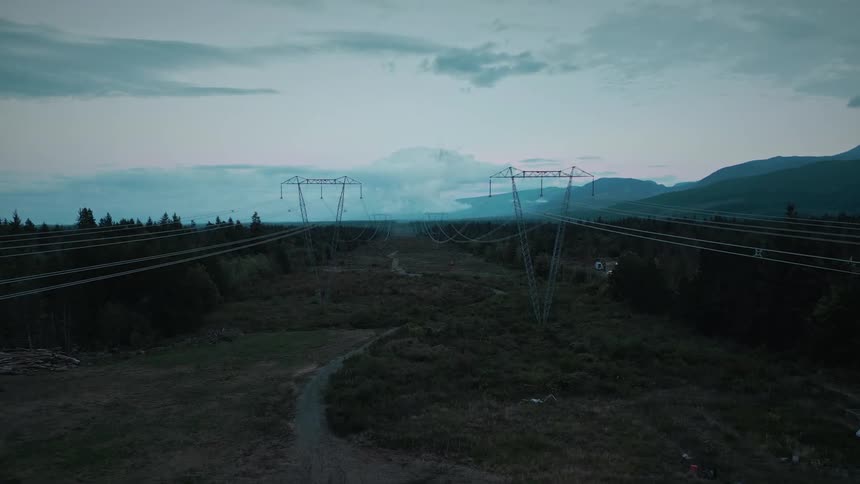 Aerial view of power towers in a natural environment