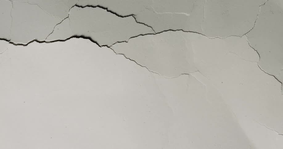 Abstract cracks on a white wall