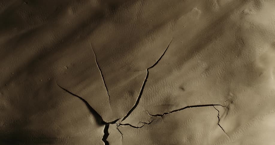 Wet abstract ground cracking