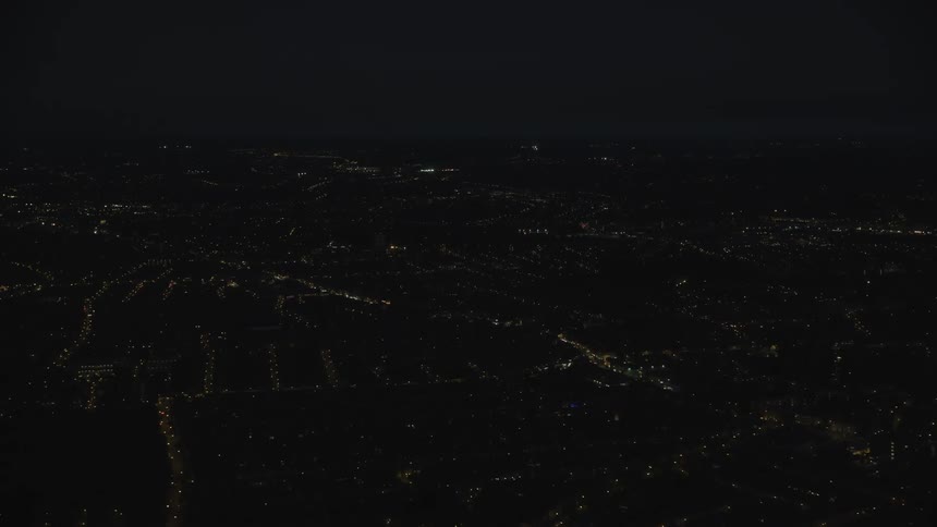 Streetlights reveal streets in city scape at night