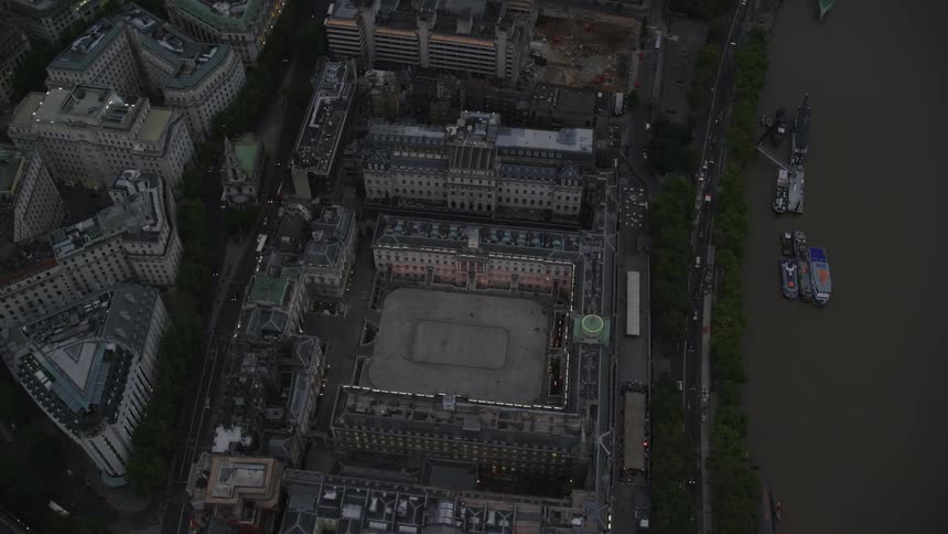 Aerial view of buildings and a bridge over a river in london