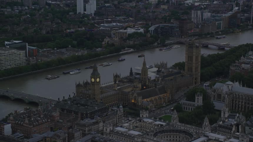 A large city with several buildings is shown from above